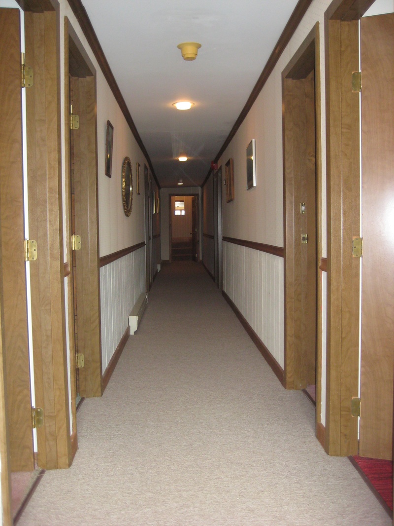 A hallway in a hotel.