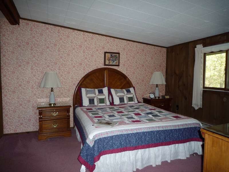A bed or beds in a room at st. john's bed and breakfast.