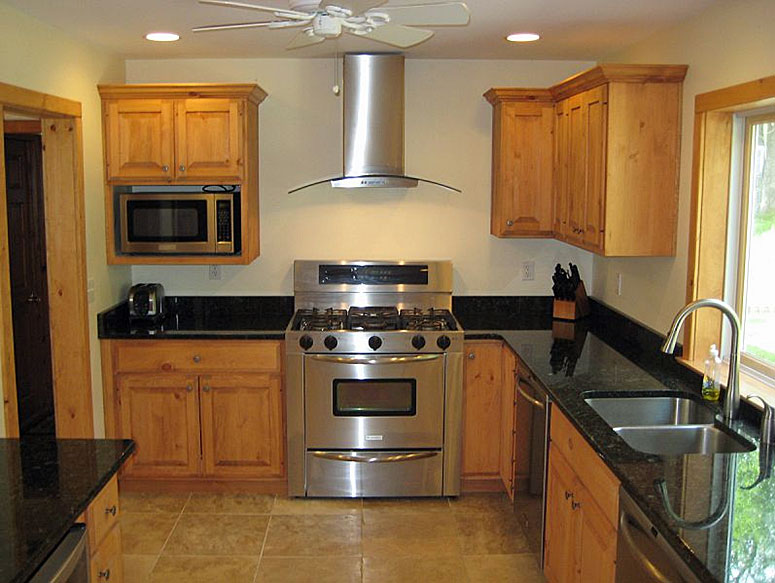 A kitchen with stainless steel appliances.