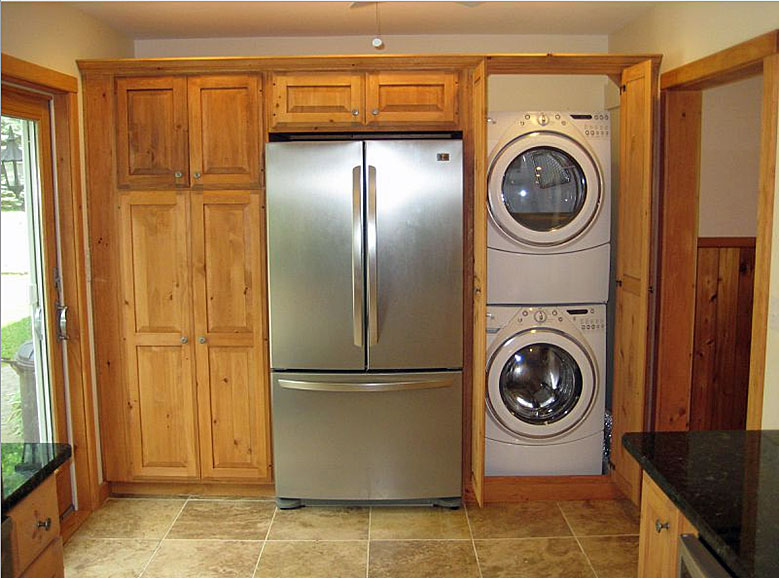 A washer and dryer in a kitchen.