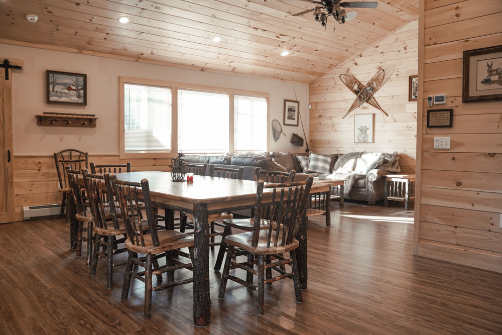 A dining room in a log cabin.