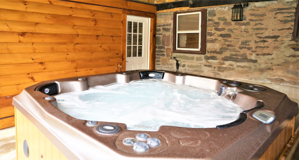 A running hot tub in a lodge