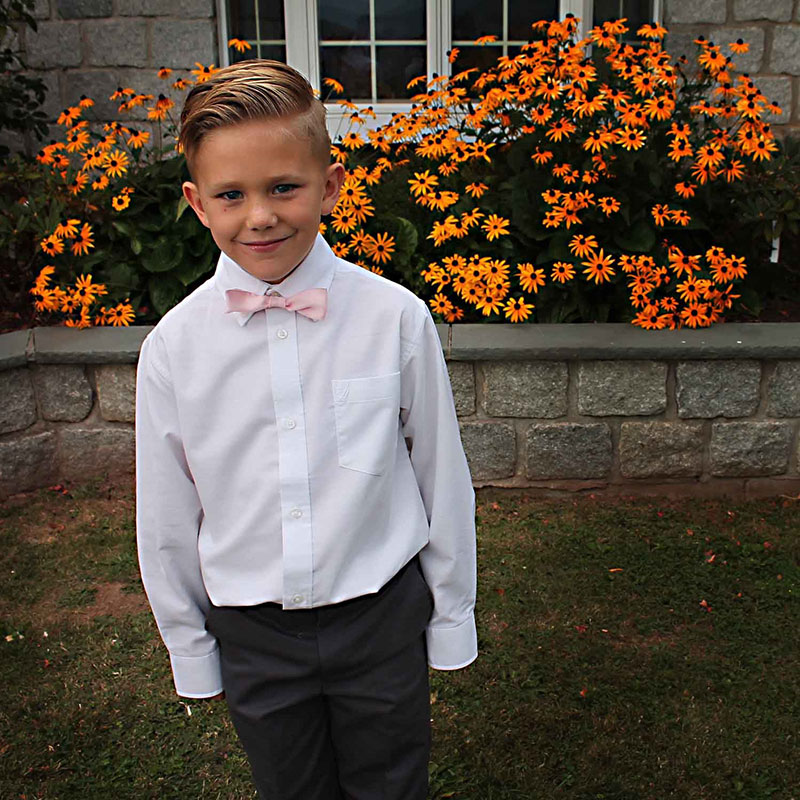 A boy wearing a bow tie.