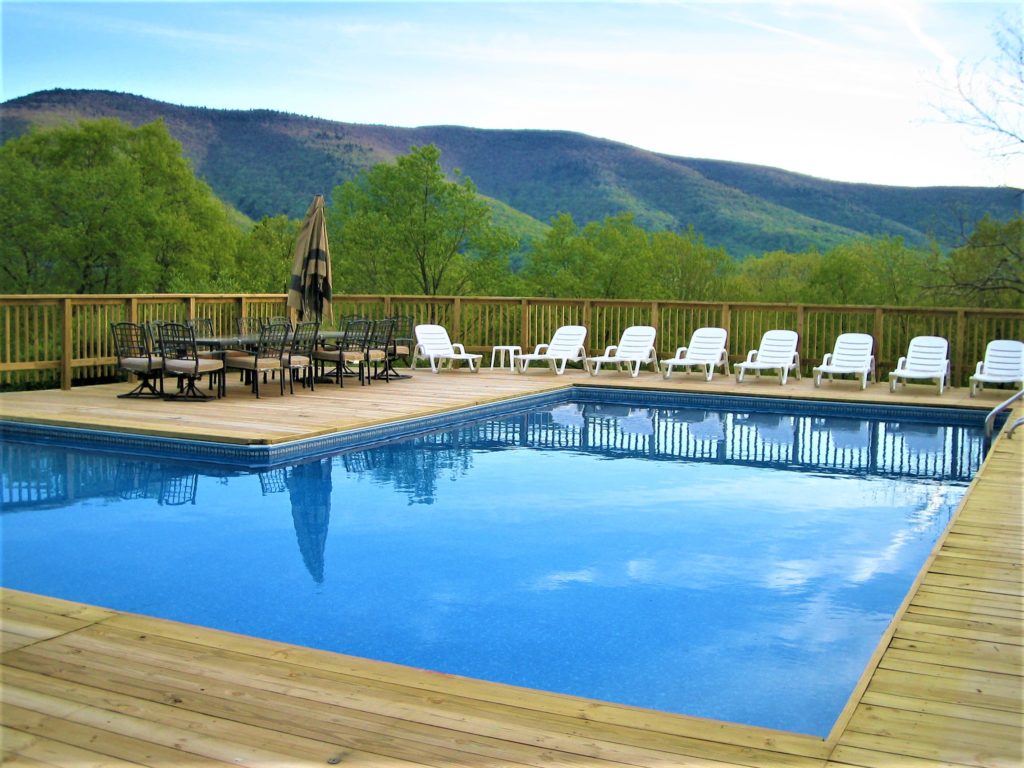 A swimming pool with a view of the mountains
