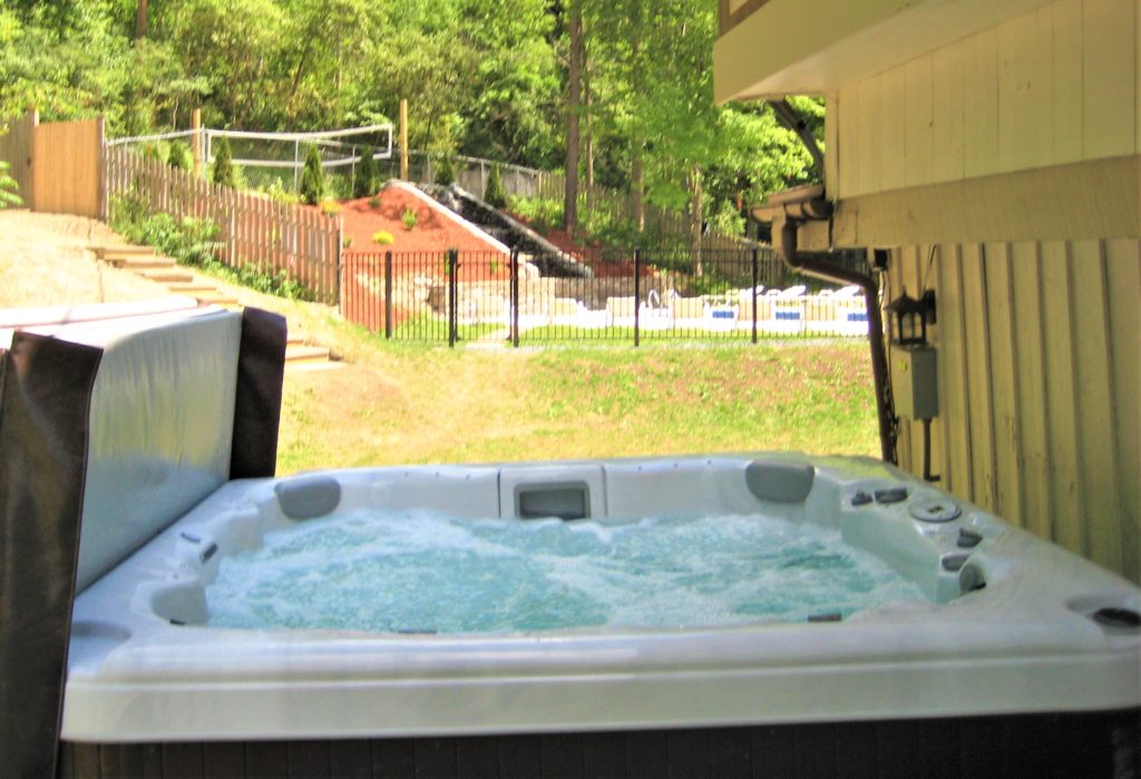 A hot tub placed outdoors